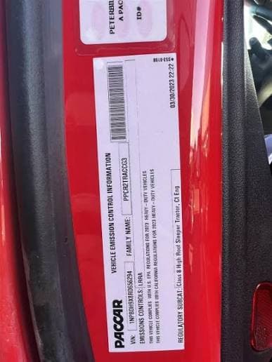 Close-up of Peterbilt paint code label on a vehicle door jamb