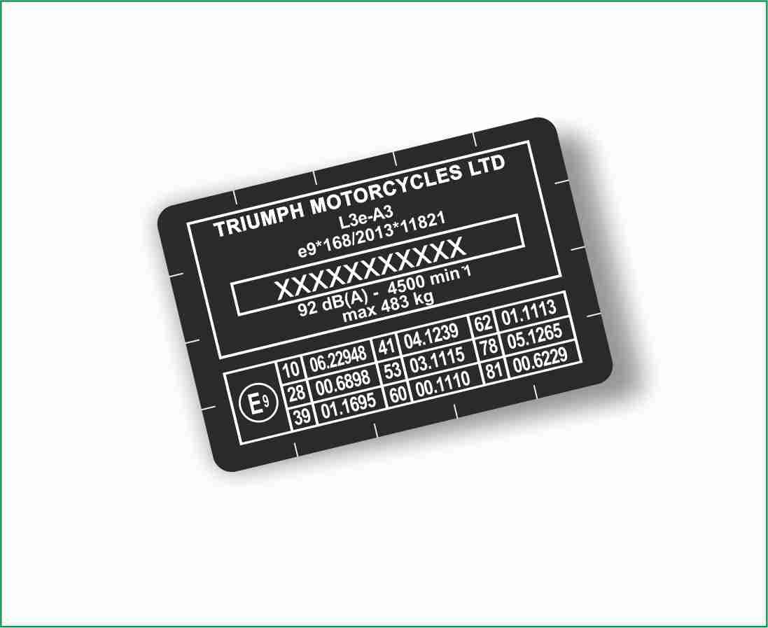 Close-up of Triumph paint code label on a vehicle door jamb