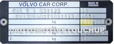 Close-up of Volvo paint code label on a vehicle door jamb