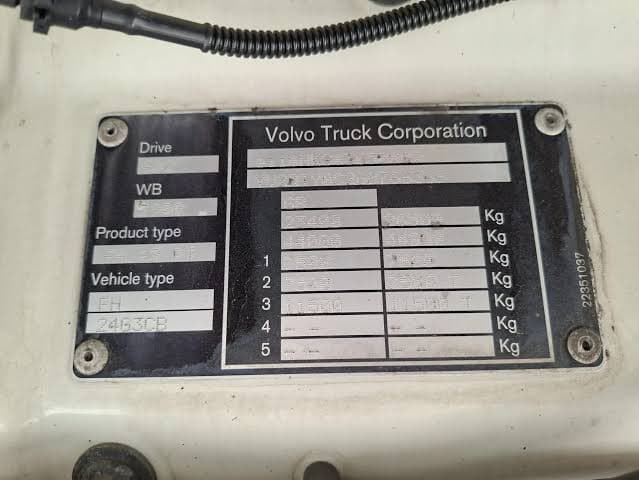 Close-up of Volvo Truck paint code label on a vehicle door jamb