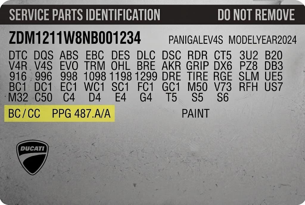 Close-up of Ducati paint code label on a vehicle door jamb