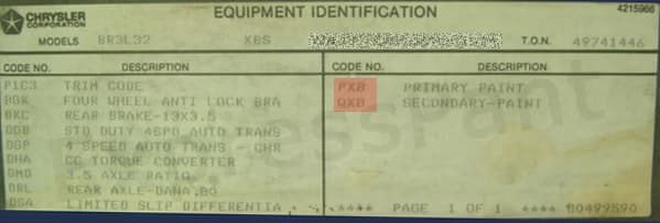 Close-up of Eagle paint code label on a vehicle door jamb