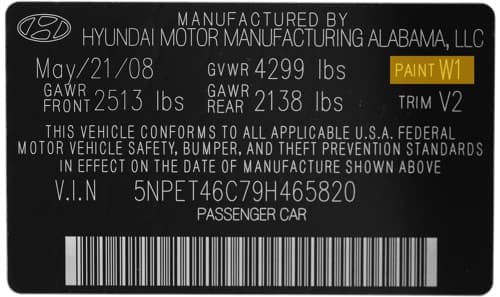 Close-up of Hyundai paint code label on a vehicle door jamb