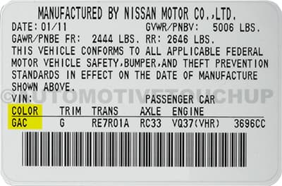 Close-up of Infiniti paint code label on a vehicle door jamb