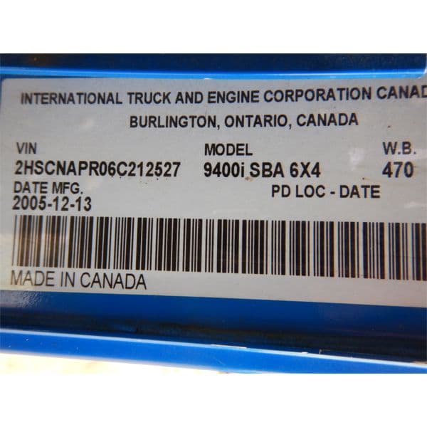 Close-up of International paint code label on a vehicle door jamb