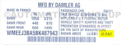 Close-up of Smart paint code label on a vehicle door jamb