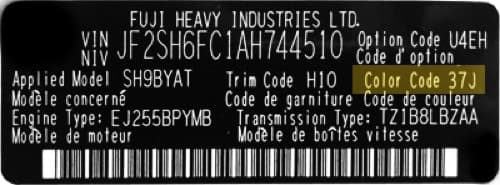 Close-up of Subaru paint code label on a vehicle door jamb