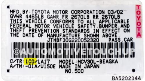 Close-up of Toyota paint code label on a vehicle door jamb