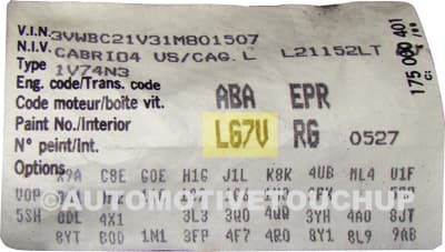 Close-up of Volkswagen paint code label on a vehicle door jamb